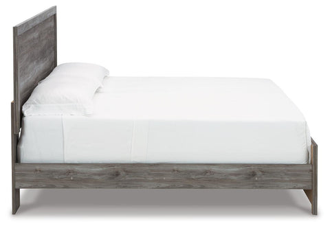 Bronyan King Panel Bed with Mirrored Dresser, Chest and 2 Nightstands