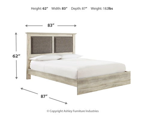 Cambeck King Upholstered Panel Bed with Mirrored Dresser and 2 Nightstands