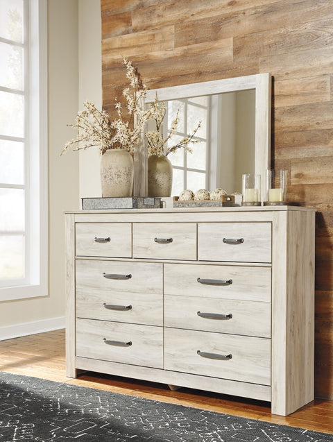 Bellaby King Crossbuck Panel Bed with Mirrored Dresser
