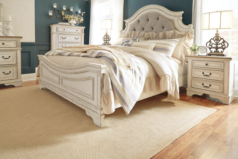 Realyn California King Upholstered Panel Bed