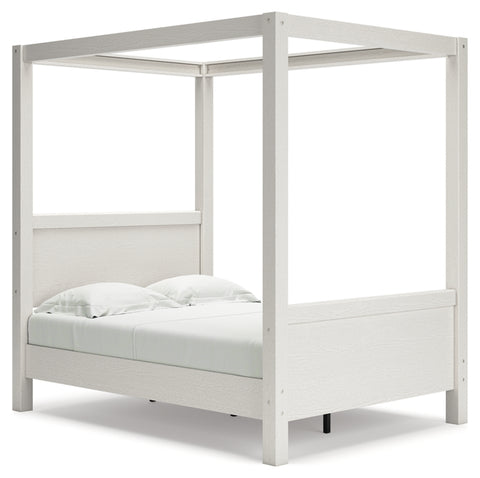 Aprilyn Full Canopy Bed with Dresser and 2 Nightstands