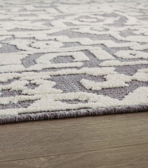 Oddetteley 4'11 x 7'2 Rug