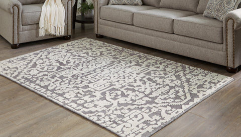Oddetteley 4'11 x 7'2 Rug