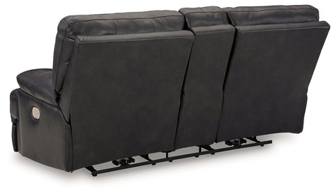 Black leather reclining sofa on a white background