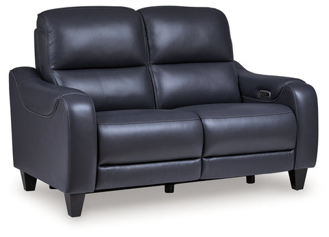 Black leather sofa on a white background