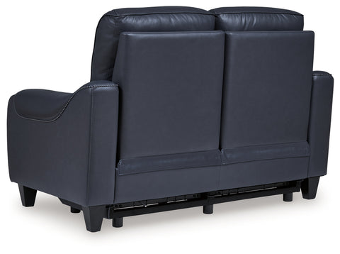 Blue leather sofa on a white background