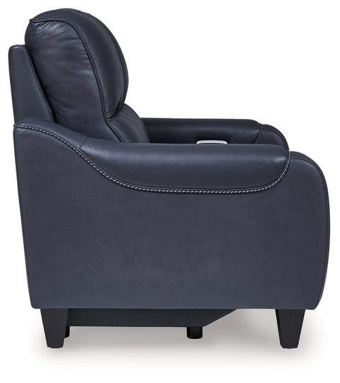 Blue leather recliner chair on a white background