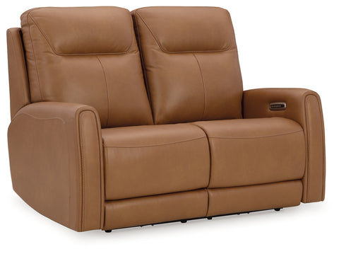 Brown leather recliner sofa on a white background