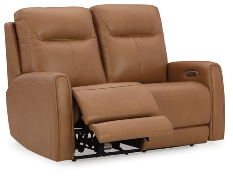 Brown leather recliner chair on a white background