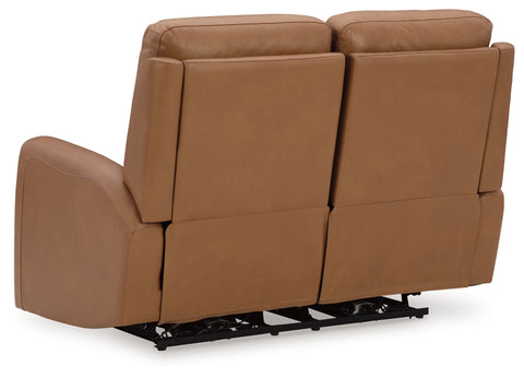 Brown leather recliner sofa on a white background