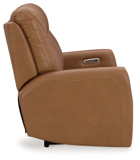 Brown leather recliner chair on a white background